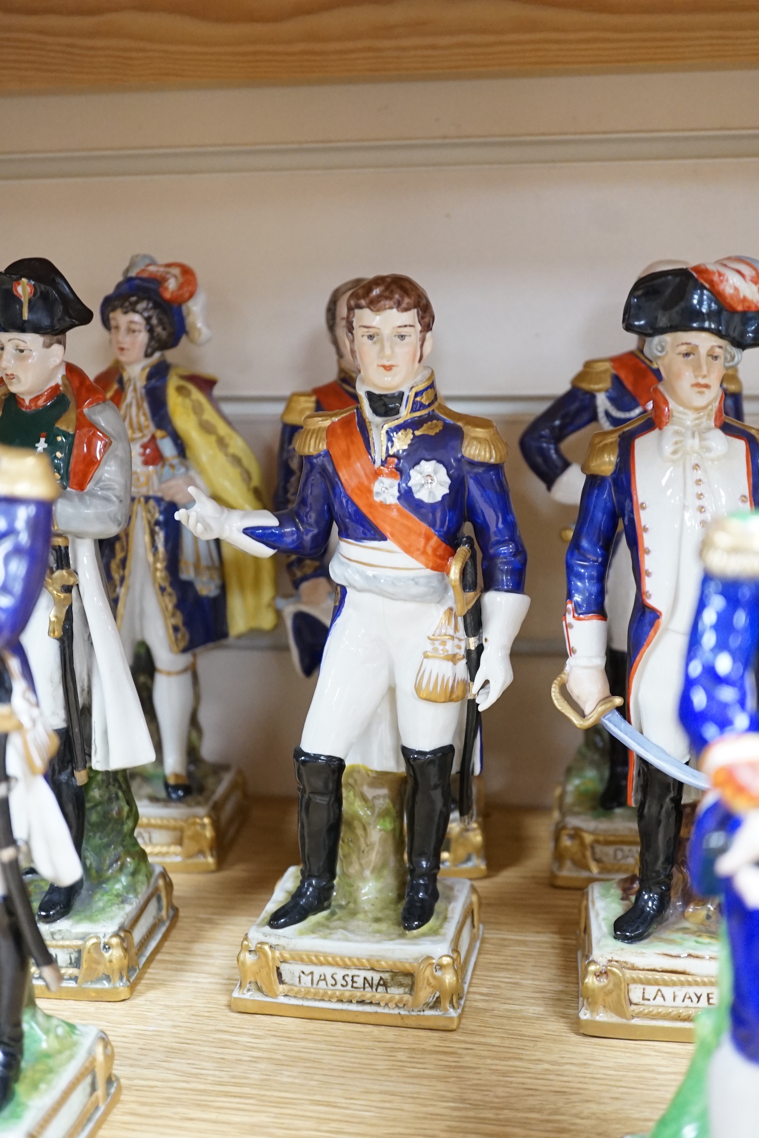 A group of fifteen named German porcelain military figures, tallest La Fayette 24cm high